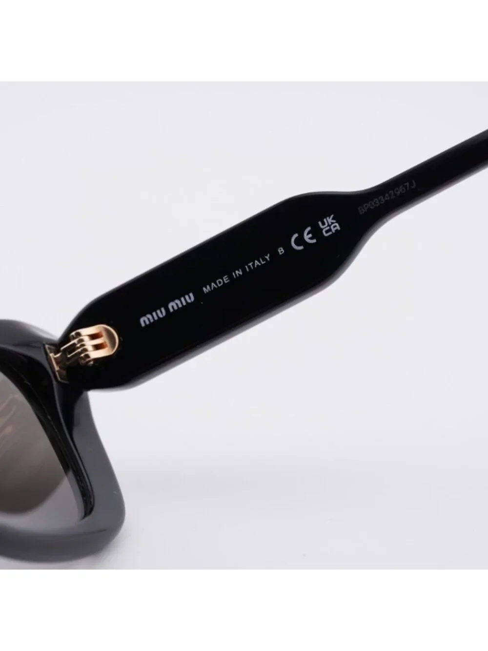 Miu Miu MU B12S 16K80Q Sunglasses Glossy Black Rectangle Frame, Dark Grey Lenses